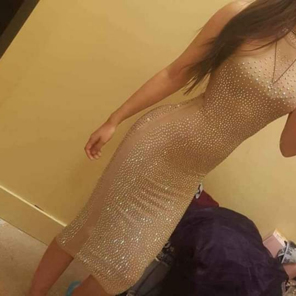 Brand new, never worn outside of dressing room